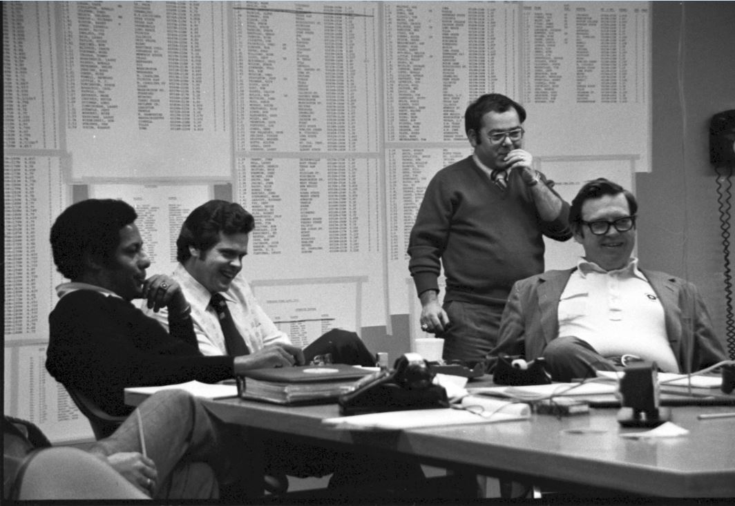 Inside the Steelers’ draft room at Three Rivers Stadium with (from left to right) Bill Nunn Jr., Dick Haley, director of player personnel, V. Tim Rooney, a nephew of Art Rooney Sr., and Art Rooney Jr., vice president. Courtesy of the Pittsburgh Steelers.